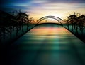 Bridge above the lake at sunset