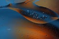 Abstract background - silhouette of a whale - waterdrops on background of different colors