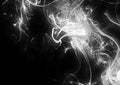 Abstract background of smoke billowing in the dark