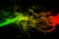 Abstract background smoke curves and wave reggae colors green, yellow, red colored in flag of reggae music Royalty Free Stock Photo