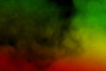 Abstract background smoke curves and wave reggae colors green, yellow, red colored in flag of reggae music Royalty Free Stock Photo