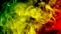 abstract background smoke curves and wave reggae colors green, yellow, red colored in flag of reggae music Royalty Free Stock Photo