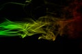 Abstract background smoke curves and wave reggae colors green, yellow, red colored in flag of reggae music Royalty Free Stock Photo