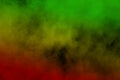 Abstract background smoke curves and wave reggae colors green, yellow, red colored in flag of reggae music Royalty Free Stock Photo