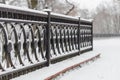 Abstract background of snow-covered fence in the park Royalty Free Stock Photo