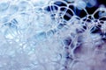 Abstract background of soap foam, suds, shower. Black background Royalty Free Stock Photo