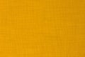 Background of soft yellow checkered textile material. Texture effect.t Royalty Free Stock Photo