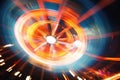 abstract background of speed motion blur carousel in motion at night, Abstract blur image of an illuminated Ferris wheel in an Royalty Free Stock Photo