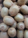 Abstract background of stacked kiwi fruits