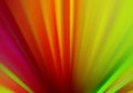 Abstract background with streaks of vibrant colors of lime green red yellow pink and purple in zoom  motion blur effec Royalty Free Stock Photo