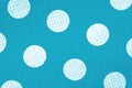 Abstract background with textile surface texture, blue fabric in large white polka dots Royalty Free Stock Photo