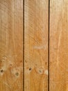 Abstract background of three vertical untreated timber planks