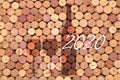 Abstract background of used old wine corks with silhouette of wine bottle and wine glasses Royalty Free Stock Photo