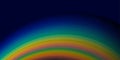 Abstract background with vibrant rainbow color spectrum forming an arc against a deep navy blue gradient sky Royalty Free Stock Photo