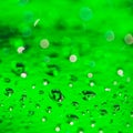 Abstract background with water drops lime green Royalty Free Stock Photo