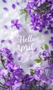 Abstract background with watercolor colorful splashes and flowers. Hello April handwritten modern calligraphy lettering. Spring Royalty Free Stock Photo