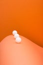 Abstract background with white balls and sheets of colored paper Royalty Free Stock Photo