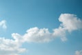 Abstract background of light blue sky and diagonal fluffy cloud. Royalty Free Stock Photo