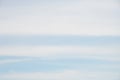 Abstract background of wide stripes white clouds on blue sky Royalty Free Stock Photo