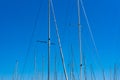 Abstract background of yacht masts with sky on the background