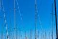 Abstract background of yacht masts with sky on the background