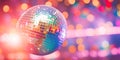 abstract backgrounds and bokeh, featuring a glittering disco ball reflecting light and creating a festive ambiance.