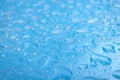 Abstract backgrounds and wallpapers concept with wet light blue background with focus on water drops and copy space Royalty Free Stock Photo