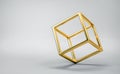 Abstract balancing gold cube on gray background