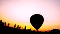 Abstract Balloon festival background. Silhouette people and hot air balloons in the Balloon festival with abstract colorful pink