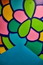 Abstract balloons or scales as wall art with green blue yellow pink purple and orange blobs at Otherworld in Ohio