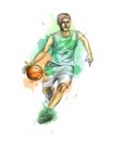 Abstract basketball player with ball from a splash of watercolor Royalty Free Stock Photo