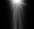 Abstract beautiful rays of light on black background. Royalty Free Stock Photo