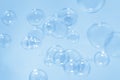 Abstract Beautiful Transparent Blue Soap Bubbles Background. Soap Sud Bubbles Water. Royalty Free Stock Photo