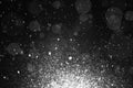 Abstract Beautiful White Bokeh Glitter Lights Black Background. Snowfall. Defocused Effect Wallpaper, Celebration Christmas. Royalty Free Stock Photo