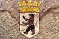 Faded Coat of arms of Berlin isolated on weathered solid rock wall background