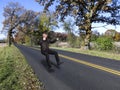 Abstract Biker Riding Motorcycle on Open Highway Royalty Free Stock Photo