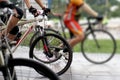 Abstract biking tournament at start line, shot of a group of race cyclists