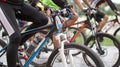 Abstract biking tournament at start line, shot of a group of race cyclists