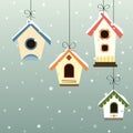 Abstract bird house set in the snowfall