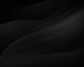 Abstract black background with smooth lines, futuristic design.