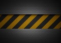 Abstract black carbon textured material design with warning tape