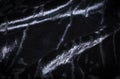 Abstract black creasy velvet fabric background texture Royalty Free Stock Photo