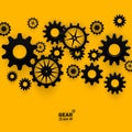 Abstract black gear wheels symbol on bright yellow