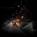 Abstract black and gold triangle shapes background with light effect