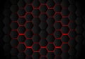 Abstract black hexagon pattern on red neon background technology style. Honeycomb Royalty Free Stock Photo