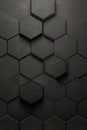 Abstract black hexagonal tiles creating a modern pattern on a wall in a contemporary setting Royalty Free Stock Photo