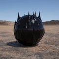 Abstract black sphere with sharp points in a desert landscape