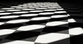 Abstract Black and White Checkered Floor with Dramatic Shadows Royalty Free Stock Photo
