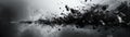 Abstract black and white explosion of particles and debris in motion creating a dynamic and chaotic visual art piece