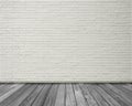 Empty space studio room of white brick wall and wooden floor. Royalty Free Stock Photo